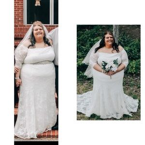 Vintage style lace wedding dress with belt and veil.